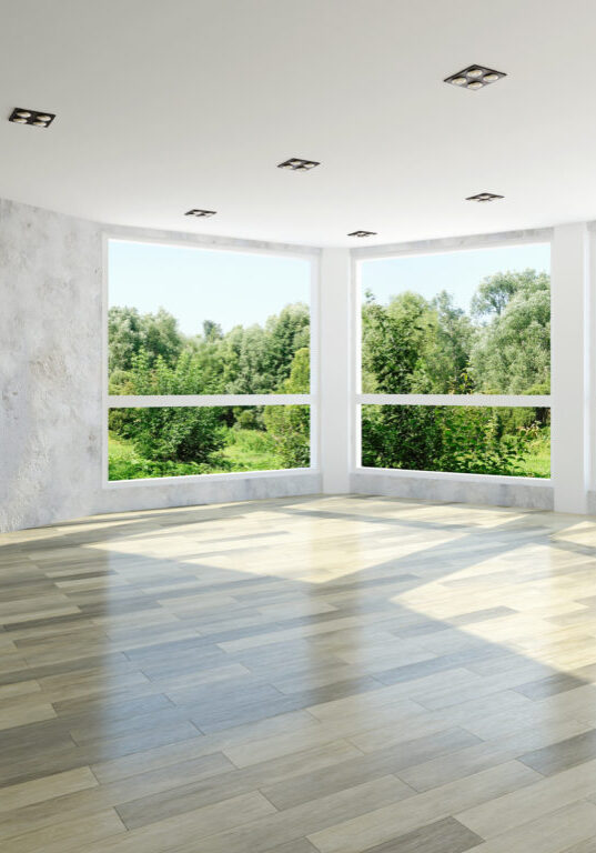 Empty room with large windows